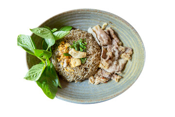 Top view of Beef fried rice with fresh egg and green basil, focus selective
