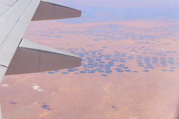 View from the window of a Flydubai plane flying over the territory of the countries of the Arabian...