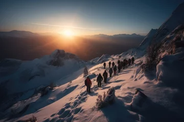 Fotobehang Hiking through the snowy mountains and towards the beautiful sunset  © DYNAMO VISUALS