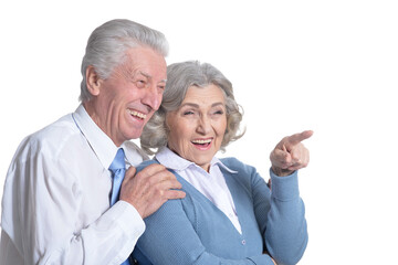 Portrait of a happy senior couple at white background
