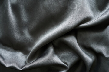 Fototapeta na wymiar gray silk fabric texture background. close up gray silk fabric texture background. gray silk fabric texture