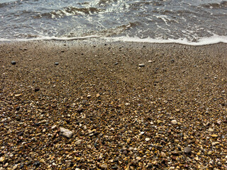 sandy beach and sea waves