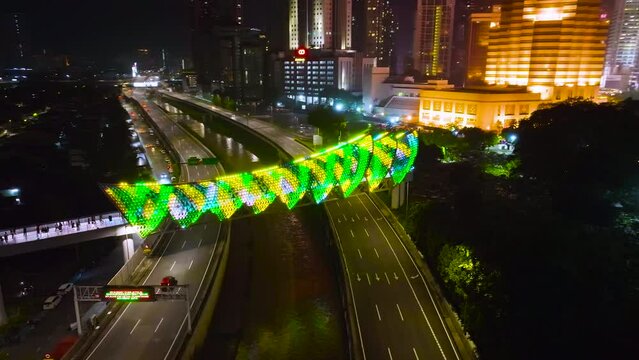 Aerial footage of the Saloma link bridge with Eid Fitr, Hari Raya aidil fitri green ketupat Theme