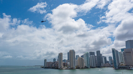 Obraz premium helicopter and miami skyscraper building. skyscraper building with helicopter view.