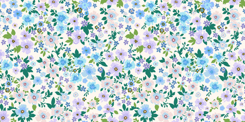 Seamless pattern. Vector flower design with cute wildflowers. Romantic abstract floral pattern on a light background. Illustration of spring nature in purple and blue tones.