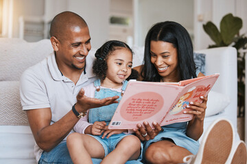 Parents, family and girl reading book in home, bonding and learning in living room. Storytelling,...
