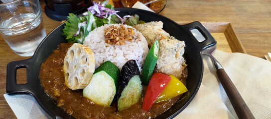 Japanese curry rice with fried chicken, karaage, and vegetables at a Hakone restaurant, Kanagawa,...