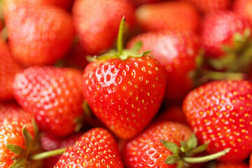 Fresh organic red strawberry fruit background