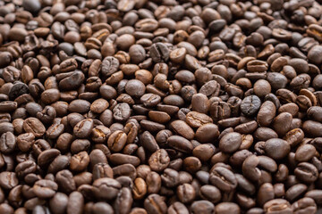 Fresh roasted brown coffee beans background