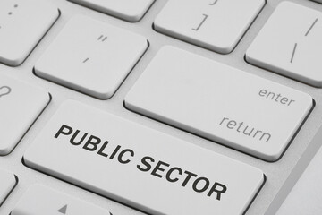 Button with text Public Sector on computer keyboard, closeup