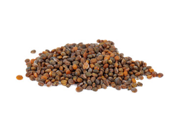 Small seeds of rocket salad or rucola isolated on a white background