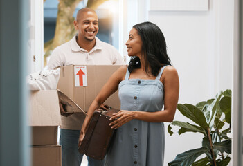 Happy couple, real estate and moving in new home with box for property investment or relocation...
