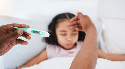 Parent, hands and thermometer with sick kid checking fever or temperature for flu or cold on bed at...