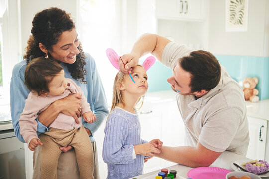 Art, creative and happy with family and face painting for celebration, holiday and bonding. Easter, color and party with children and parents with bunny ears at home for happiness, vacation or relax