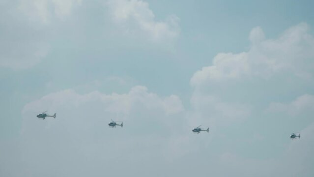 Jakarta, Indonesia - April 9, 2023: Indonesian Air Force (TNI AU) EC120B Colibri helicopter performs at the Indonesian Air Force's birthday event at Halim Perdana Kusuma