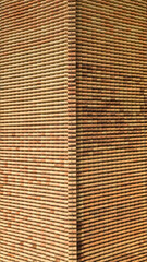 Perpendicular aerial view of an orange tiled roof. Ideal for textures and patterns.