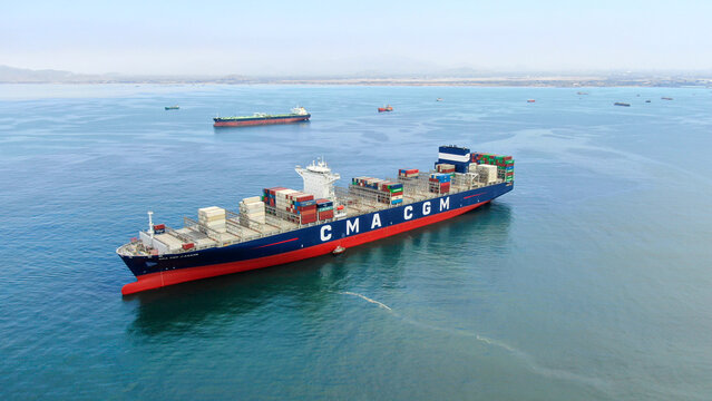 Callao, Lima, Peru -12.04.2022 Aerial view of ultra large container ship CMA CGM J.Adams in discharged condition at anchor near port Callao, Lima, Peru awaiting for enter to port