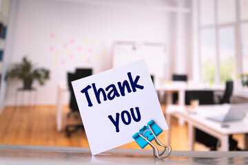 Text Thank you on the short note texture background