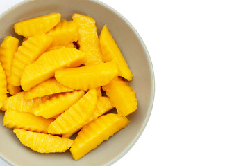 Sweet yellow mango fruit slices
