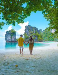 Koh Hong Island Krabi Thailand, couple of men and woman on the beach of Koh Hong