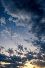 Naklejka na ściany i meble Clouds in the blue sky at sunset, beautiful photo digital picture