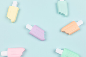 closeup of popsicles on cyan surface icecream