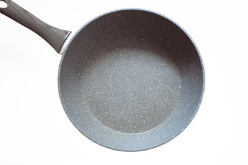 frying pan with handle and non-stick layer isolated on white background