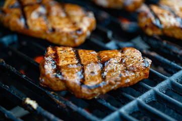pork tenderloin looking tasty on barbeque grill