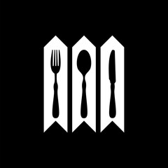 Set of fork and knife on a plate icon isolated on black background