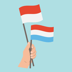 Flags of Monaco and Luxembourg, Hand Holding flags