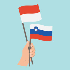 Flags of Monaco and Slovenia, Hand Holding flags