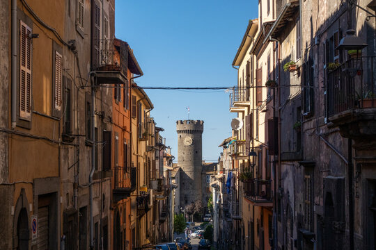 Italy, Lazio, Viterbo, Rows of houses with tower of Palazzo Ducale o delle Logge in background
