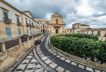 Fototapeta na wymiar Palazzo Vescovile and Holy Saviour Church in historic part of Noto city, Sicily in Italy