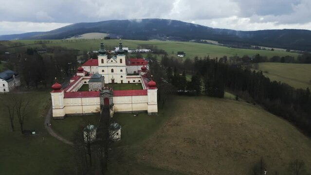 Stunning aerial view of the Hedeč pilgrimage site in the Czech Republic, showcasing the Mother of God monastery perched atop a mountain.