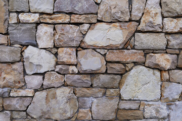 Beautiful wall made with dry stone typical of southern Europe and Mediterranean areas
