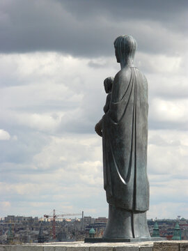 Budapest (Hungary). Bronze statue of the Virgin Mary by the sculptor Laszlo Matyassy next to the Buddha Palace