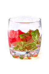 Natural fruity jelly in cup, isolated on white background.