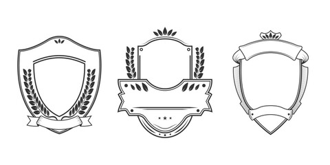 Vintage shield set with ribbon and laurel wreath. Crest badge. Heraldic banner or emblem design template. Coat of arms icon. Vector illustration.