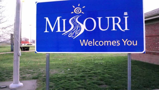Welcome to Missouri sign with video tilting up.