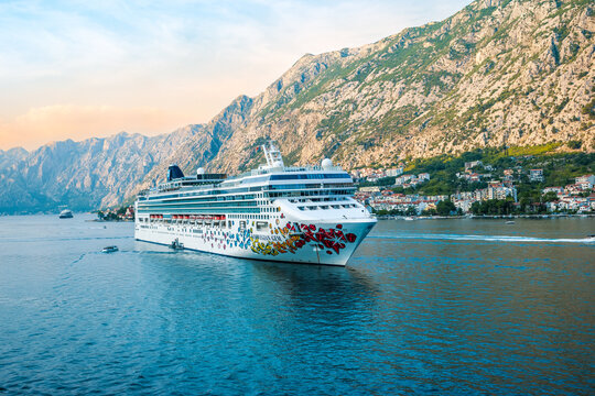 KOTOR, MONTENEGRO - SEPTEMBER 5, 2022: Cruise ship Norwegian Gem of NCL Norwegian Cruise line sailing away  from Kotor, Montenegro.