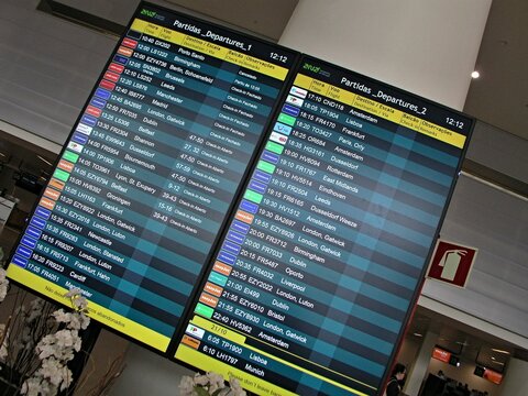 Arrival and departure panel on the Faro airport, Algarve - Portugal 