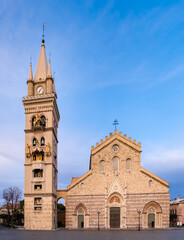 Fototapeta na wymiar Messina Cathedral or Duomo di Messina. Basilica located on Piazza Duomo Square in Sicily, Italy. Messina Bell tower is famous for biggest and most complex astronomical clock with gilded bronze statues