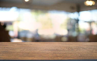 Empty dark wooden table in front of abstract blurred bokeh background of restaurant . can be used for display or montage your products.Mock up for space.