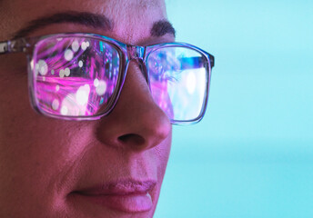 Futuristic reflections in scientists eyeglasses