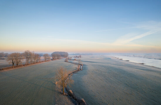 Netherlands, Gelderland, Floodlands and river IJssel on cold morning