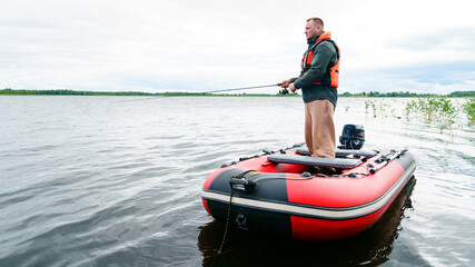 Morning fishing. A man is a fisherman in a boat. Activity outside