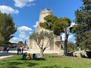 Nîmes, France - 04 19 2023: The Gardens of La Fontaine. View of the Magne tower.