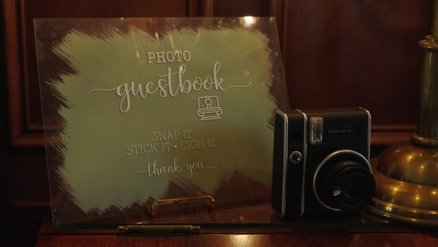 Creative wedding event snapshot guest book with vintage style retro instant camera