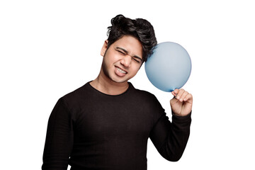PNG of a young boy smiling with balloon, eyes closed and holding a balloon in his hand near his...