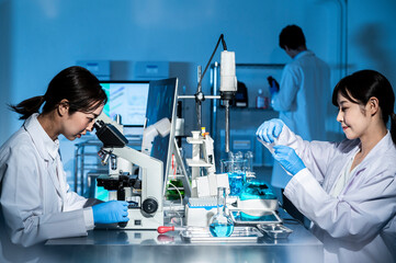 Asian female scientists at the laboratory